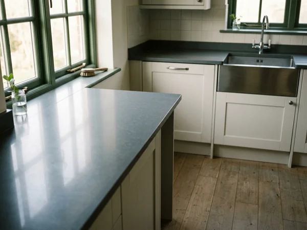 Sanitized kitchen counter and floor after deep decontamination
