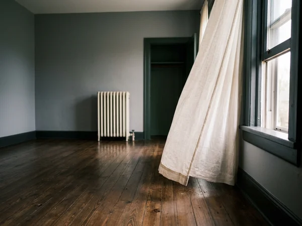 Clean empty bedroom with open window after odour elimination